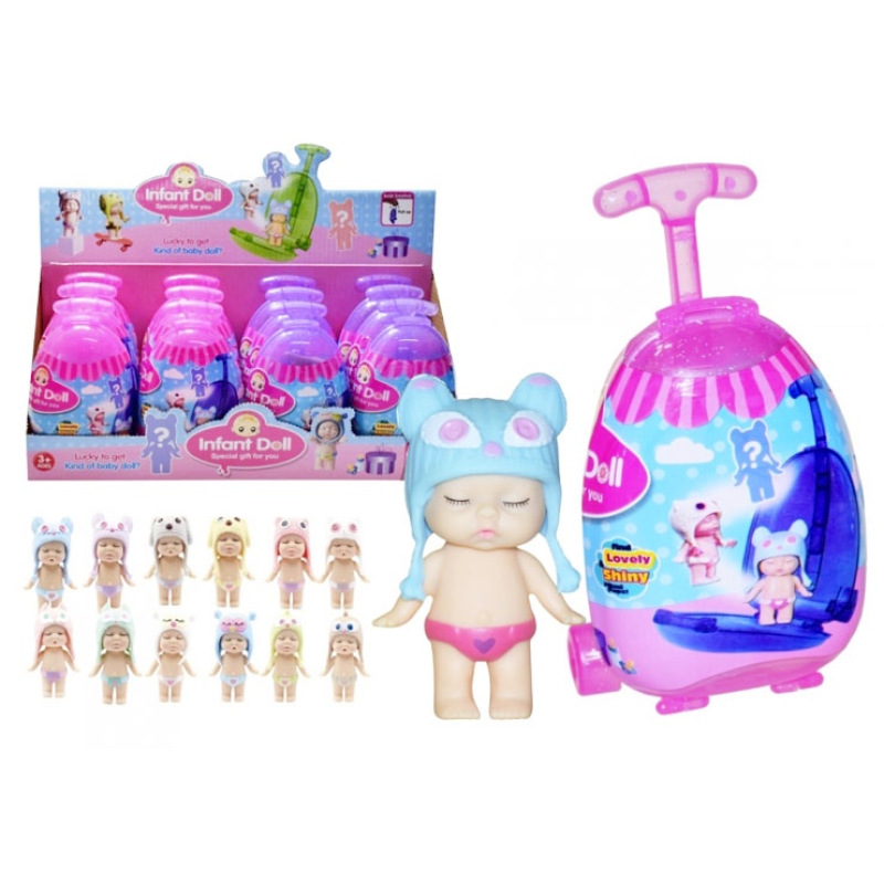 Bábika v kufríku s doplnkami